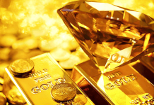 Giá vàng trượt về gần mốc chủ chốt 3.300 USD/oz do đồng USD hồi phục